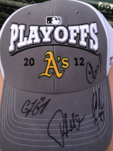 2012 Playoff hat signed by: Coco Crisp, Bob Melvin, Brandon Moss and Yoenis Cespedes